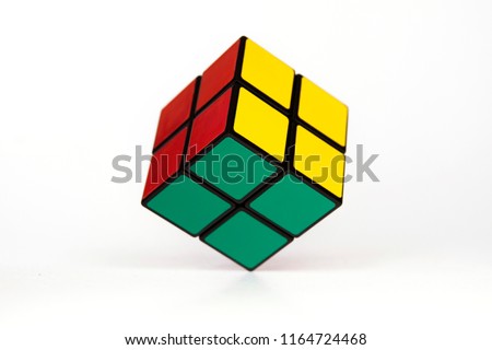 Simple mind challanging puzzle, rubik kind of cube hovering over white background, simplicity, ease Foto d'archivio © 