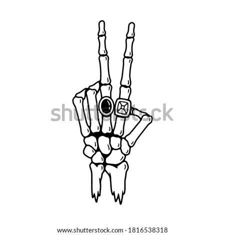 SKELETON HAND WITH RINGS BLACK WHITE BACKGROUND