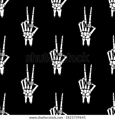 SKELETON HAND WITH RINGS SEAMLESS PATTERN WHITE BLACK BACKGROUND