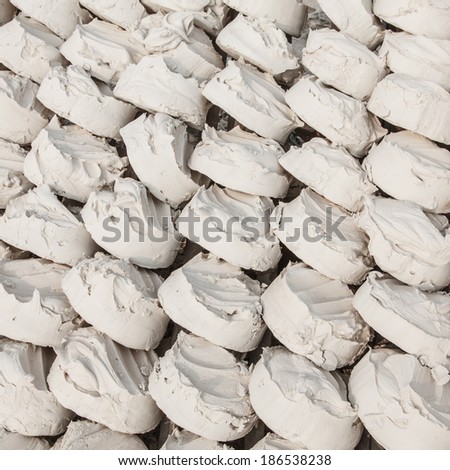 Soft-prepared chalk or clay rich in alumina or white clay filler. It is powder use for face or body. Or for major festival for example Songkran festival