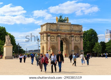 PARIS - JUNE 1 :Triumphal Arch (Arc de Triomphe du Carrousel) at Tuileries gardens in Paris, France on June 1,2015. Monument was built between 1806-1808 to commemorate Napoleon\'s military victories.