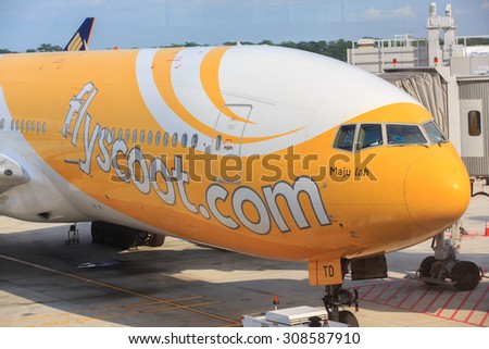 SINGAPORE - AUGUST 2: Scoot low cost carrier Boeing 777-200  at Changi Airport on August 2, 2015 in Singapore