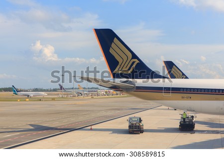 SINGAPORE - AUGUST 2, 2015: Singapore Airlines airplane. Singapore Airlines is the flag carrier of Singapore and a 5 star airline.