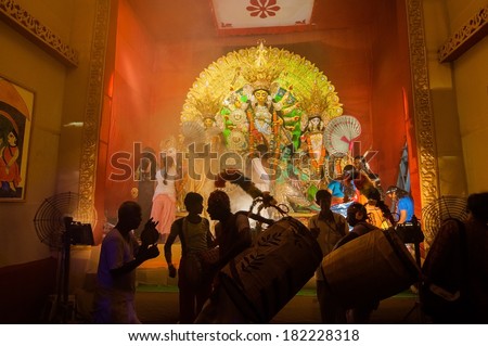 KOLKATA , INDIA - OCTOBER 11, 2013 : Durga Puja festival celebration. It is the biggest religious festival of Hinduism and local Bengali Community.