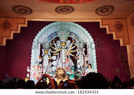 KOLKATA , INDIA - OCTOBER 12, 2013 : Durga Puja festival celebration. It is the biggest religious festival of Hinduism and Bengalis.