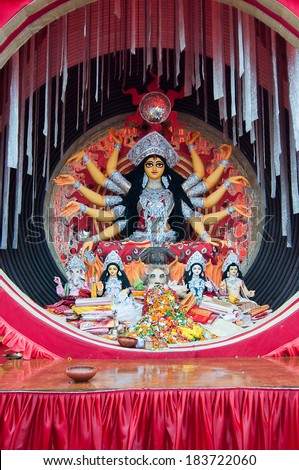 KOLKATA , INDIA - OCTOBER 13, 2013 : Durga Puja festival celebration. It is the biggest religious festival of Hinduism and Bengalis