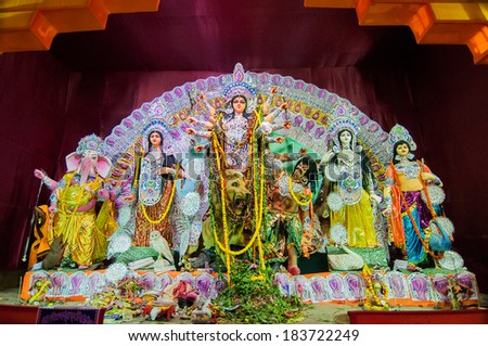 KOLKATA , INDIA - OCTOBER 13, 2013 : Durga Puja festival celebration. It is the biggest religious festival of Hinduism and Bengalis