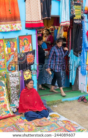 KOLKATA, WEST BENGAL , INDIA - DECEMBER 12TH 2014 : Handmade painted clothes, handicrafts show during Handicraft Fair in Kolkata - the biggest handicrafts fair in Asia.