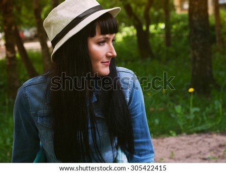 Closeup portrait a girl in  hat summer day outside copy space