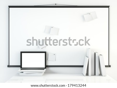 White notes on screen projector and books with laptop on a table