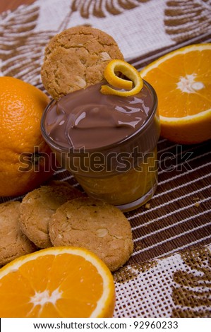 Chocolate trifle made with Natural Orange, chocolate pudding and orange cookies, on a brown mat