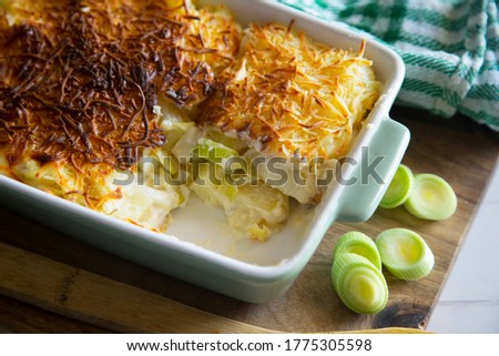 Similar – Image, Stock Photo Baking Potatoes And Leek Soup