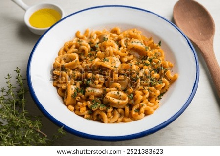 Similar – Image, Stock Photo Pan with tasty fideua dish on table