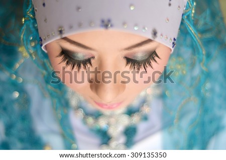 Portrait of young beautiful bride Close up. Malay Wedding