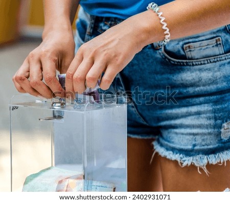 Image, Stock Photo charity fundraising donations fifty hryvnia in an acrylic box