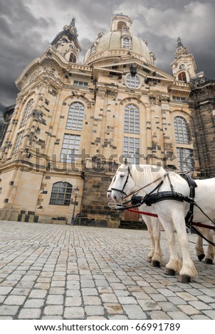 Church of Our Lady (Frauenkirche) in Dresden with pair of white horses in front