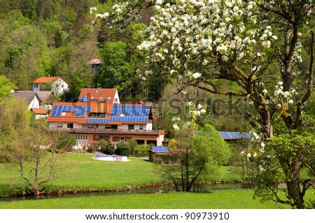 Solar panels on house and barns of privately owned farm in Frankonian Switzerland, Bavaria, Germany