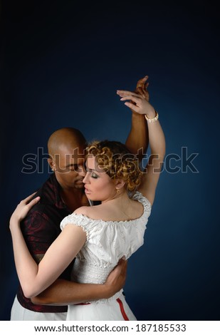A couple dancing cuban salsa, text space
