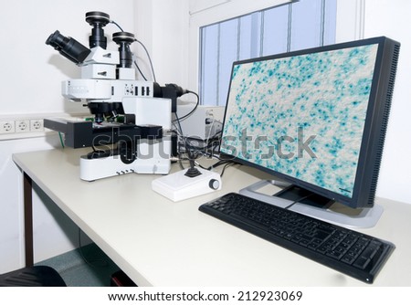 Modern microscope equipped with digital camera, computer and monitor