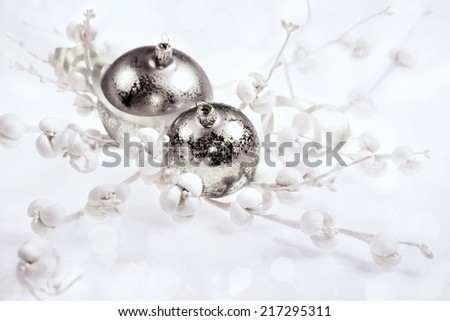 Silver Christmas decorations on white background