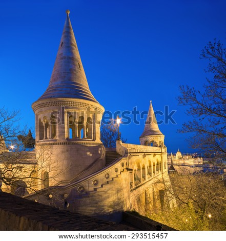 Fishermans Bastion in Budapest, Hungary at night. Vertical panorama made from three frames.