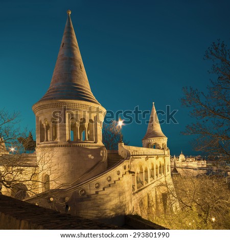Fishermans Bastion in Budapest, Hungary at night. Vertical panorama made from three frames. Square composition. This image is toned.