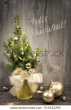 Greeting card with decorated Christmas tree and caption \