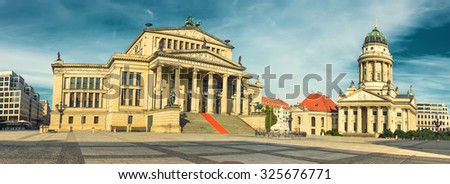 Gendarmenmarkt in Berlin with Concert Hall and French Church. Panorama with focus on Concert Hall. This image is toned.