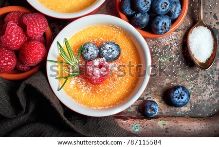 Similar – Image, Stock Photo Cream brulee on dark wood