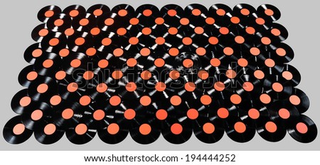 Music - Collection of vinyl records, isolated on light gray background for easy editing. The labels can be customized, the image is suitable for background use.