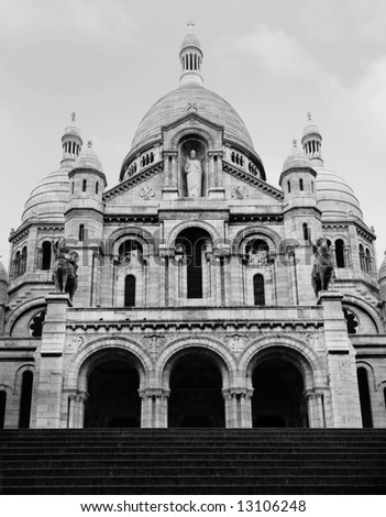 looking up at Sacred Heart Basilica paris in black and white