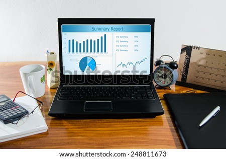 Business summary chart and planing in computer on desktop.