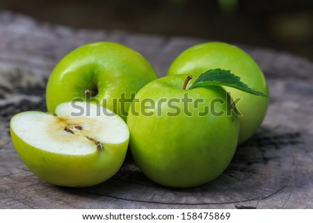 Green apple and half with seeds Green apple.