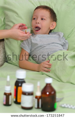 The boy is sick. Mom treats drugs