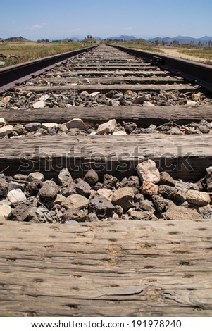 The old train tracks through the southern California desert.
