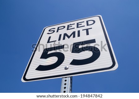The fifty-five miles per hour street sign in the California sun.