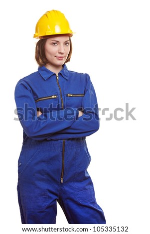 Female Worker In Blue Overall And Yellow Safety Helmet Stock Photo ...