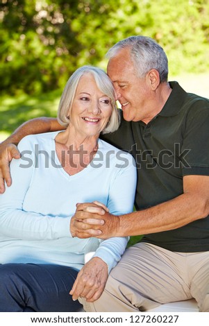 Senior Man And Old Woman Holding Hands In A Summer Garden Stock Photo ...