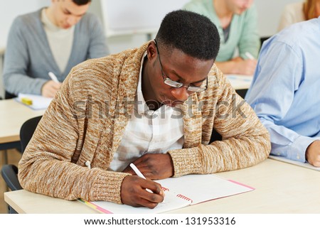 African student learning in a university class