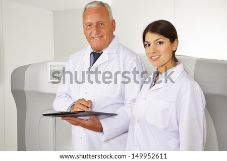 Doctor and female physician as team in radiology in a hospital