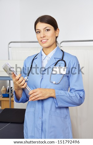 Female doctor with medical records in radiology in a hospital