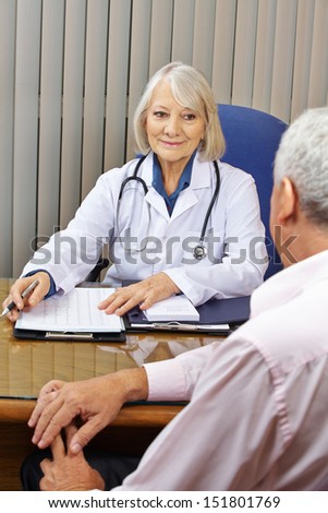 Doctor at a consultation with patient in her office