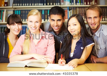 Group of students learning in library at university