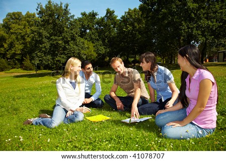 Group of students learning on campus of university