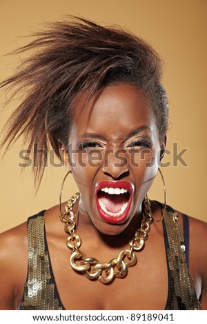 Angry frustrated young african woman screaming loudly