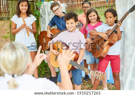 Similar – Image, Stock Photo Vocal sample| woman with analog headphones, singing happily to herself