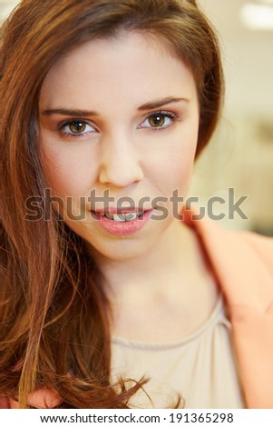 Frontal face of an young attractive woman