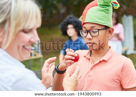 Similar – Image, Stock Photo Vocal sample| woman with analog headphones, singing happily to herself