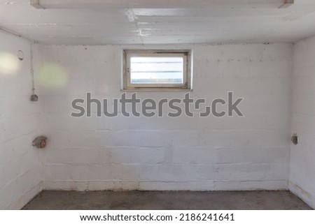 Similar – Foto Bild Kellerfenster in einer alten verwaschenen rotbraunen Fassade mit Herbstlaub und Kopfsteinpflaster in Wettenberg Krofdorf-Gleiberg bei Gießen In Hessen