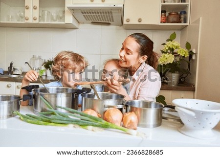 Image, Stock Photo Preparation of soup in a pot, in nature.